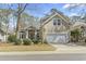 Charming two-story home with a two-car garage and well-maintained landscaping at 929 Tidewater Dr., North Myrtle Beach, SC 29582