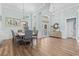 Grand foyer features an arched transom over the door, wood flooring, and high ceilings at 929 Tidewater Dr., North Myrtle Beach, SC 29582