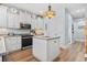 Well-equipped kitchen features sleek appliances and an island for meal prep at 929 Tidewater Dr., North Myrtle Beach, SC 29582