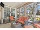 Cozy sunroom with wicker furniture and view of the golf course at 929 Tidewater Dr., North Myrtle Beach, SC 29582