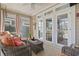 Covered patio featuring comfortable wicker furniture and bright, natural light at 929 Tidewater Dr., North Myrtle Beach, SC 29582