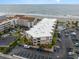 Aerial view showcasing the building's proximity to the beach and parking area at 9581 Shore Dr. # 223, Myrtle Beach, SC 29572