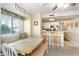 Open dining area features a large window and comfortable seating at 9581 Shore Dr. # 223, Myrtle Beach, SC 29572