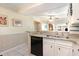 Kitchen area featuring granite countertops, white cabinetry, and an open view to the living space at 9581 Shore Dr. # 223, Myrtle Beach, SC 29572