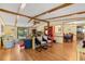 Open living space with hardwood floors, exposed beams, and a dining area in view at 976 South Marlin Circle, Murrells Inlet, SC 29576