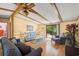 Bright living area featuring wood beam ceiling, stylish furnishings, and an inviting atmosphere at 976 South Marlin Circle, Murrells Inlet, SC 29576