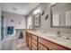 Bathroom featuring a double sink vanity and framed mirrors at 1001 Harvest View Ave., Conway, SC 29527