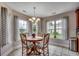 Charming breakfast nook with tile flooring and sunlit windows at 1001 Harvest View Ave., Conway, SC 29527