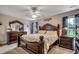 Spacious main bedroom with ceiling fan, ensuite bath, and ample natural light at 1001 Harvest View Ave., Conway, SC 29527