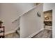 Bright staircase featuring neutral walls, carpeted steps, and white trim. It leads to the upper level at 1001 Harvest View Ave., Conway, SC 29527