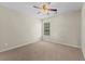 Empty bedroom featuring a ceiling fan, neutral walls, carpet, and a window at 1004 Harvester Circle # 1004, Myrtle Beach, SC 29579