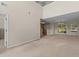 Open living room and dining area with high ceilings and views of the entryway and outdoors at 1004 Harvester Circle # 1004, Myrtle Beach, SC 29579