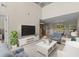 Bright living room boasts vaulted ceilings and an open layout to the kitchen and dining area at 1004 Harvester Circle # 1004, Myrtle Beach, SC 29579