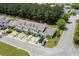 Aerial view of the townhome exteriors showing the well-maintained landscaping and private parking spaces at 1004 Harvester Circle # 1004, Myrtle Beach, SC 29579