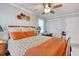 Comfortable bedroom is equipped with ample storage and neutral tones, complemented by vibrant accents for added character at 1028 1St Ave. S, North Myrtle Beach, SC 29582
