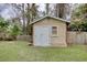 Outdoor shed with double doors and a window providing extra storage space at 1028 1St Ave. S, North Myrtle Beach, SC 29582