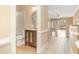 Bathroom with stylish vanity and a tiled shower, with views of the living space at 106 Birch N Coppice Dr. # 2, Surfside Beach, SC 29575