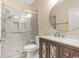 The bathroom features a new tiled shower, modern vanity, and updated fixtures at 106 Birch N Coppice Dr. # 2, Surfside Beach, SC 29575