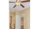 Neutral bedroom featuring tan walls with white trims and a ceiling fan at 106 Birch N Coppice Dr. # 2, Surfside Beach, SC 29575
