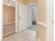 View from entryway into bedroom and out the front door at 106 Birch N Coppice Dr. # 2, Surfside Beach, SC 29575