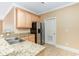 Kitchen with stainless steel appliances, granite countertops, and tile flooring at 106 Birch N Coppice Dr. # 2, Surfside Beach, SC 29575