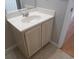 Bathroom featuring a sink with vanity, and neutral tile flooring, providing a clean aesthetic at 108 Pickerel Blvd., Longs, SC 29568