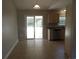 Dining room with tile flooring and sliding glass door leading to the outside at 108 Pickerel Blvd., Longs, SC 29568