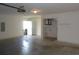 Open garage with a utility closet and door to the exterior at 108 Pickerel Blvd., Longs, SC 29568
