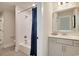 Bright bathroom featuring a tub with shower, modern vanity, and a contemporary design at 1118 Laconic Dr., Myrtle Beach, SC 29588