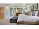 Spacious main bedroom features large windows, a tray ceiling, and neutral tones, creating a relaxing retreat at 1118 Laconic Dr., Myrtle Beach, SC 29588