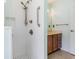 The bathroom features tiled shower, vanity with wooden cabinets, and modern fixtures at 112 Boxwood Ln., Conway, SC 29526