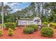 Myrtle Trace 55+ retirement community sign surrounded by beautiful landscaping at 112 Boxwood Ln., Conway, SC 29526