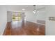 Spacious living room with hardwood floors and sliding door access to patio at 112 Boxwood Ln., Conway, SC 29526