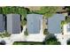 Aerial view of the house showing the backyard, roof, and surrounding landscaping at 1131 Camellia Dr., Surfside Beach, SC 29575