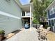 A beautifully designed backyard with patio, outdoor seating, and covered porch at 1131 Camellia Dr., Surfside Beach, SC 29575