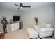 Cozy bonus room with wet bar, beverage cooler, modern ceiling fan, and comfortable seating at 1131 Camellia Dr., Surfside Beach, SC 29575