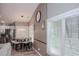 Dining area with table and chairs, and views into the living room and kitchen at 1131 Camellia Dr., Surfside Beach, SC 29575