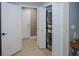 Bright laundry area features a stacked washer and dryer and easy access to the exterior at 1131 Camellia Dr., Surfside Beach, SC 29575