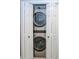 A full-sized stackable washer and dryer are conveniently hidden behind bifold doors at 1131 Camellia Dr., Surfside Beach, SC 29575