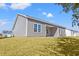 Well-maintained backyard featuring patio and green grass at 116 Old Chimney Ln, Conway, SC 29526