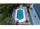 Aerial view of a private pool with ample lounging space and a nearby cabana at 119 Berry Tree Dr., Pawleys Island, SC 29585