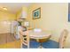 Well-equipped kitchenette with white appliances, perfect for convenient meal preparation in your vacation stay at 1207 S Ocean Blvd. S # 50910, Myrtle Beach, SC 29577