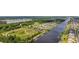 An aerial view of the intercostal waterway shows community, the docks, a park and the waterway at 136 Queens Cove Place # B, Myrtle Beach, SC 29579