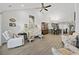 Bright and airy living room with vaulted ceilings, hardwood floors, and stylish furnishings at 136 Queens Cove Place # B, Myrtle Beach, SC 29579