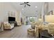 Bright living room with neutral paint, hardwood floors, lots of natural light and stylish comfortable furniture at 136 Queens Cove Place # B, Myrtle Beach, SC 29579