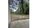 View of backyard with lush greenery and foliage, providing a natural and private setting at 1432 Highway 544 # F1, Conway, SC 29526