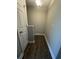 This landing features wood-look floors at 1432 Highway 544 # F1, Conway, SC 29526