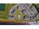 Aerial view of a condo community on the water, highlighting the swimming pool and parking at 1514 Lanterns Rest Rd. # 304, Myrtle Beach, SC 29579