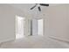 Spacious bedroom includes neutral carpet, ceiling fan and access to multiple rooms at 1514 Lanterns Rest Rd. # 304, Myrtle Beach, SC 29579