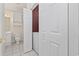 Tiled utility room and laundry area with a washer/dryer hookup and a closet at 1514 Lanterns Rest Rd. # 304, Myrtle Beach, SC 29579